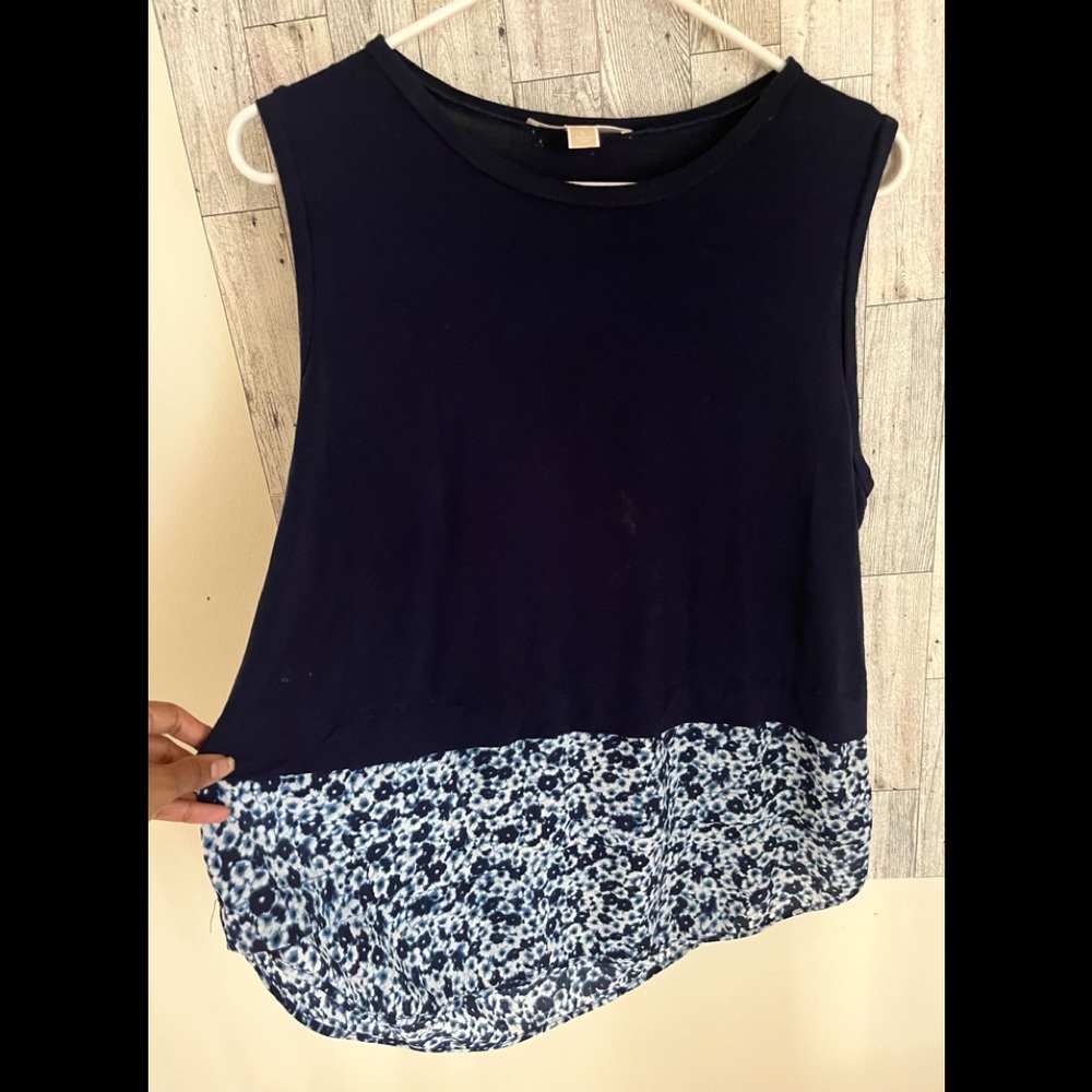 Authentic MKs Dark blue L top. The flower portion is layered and lightly sheer.